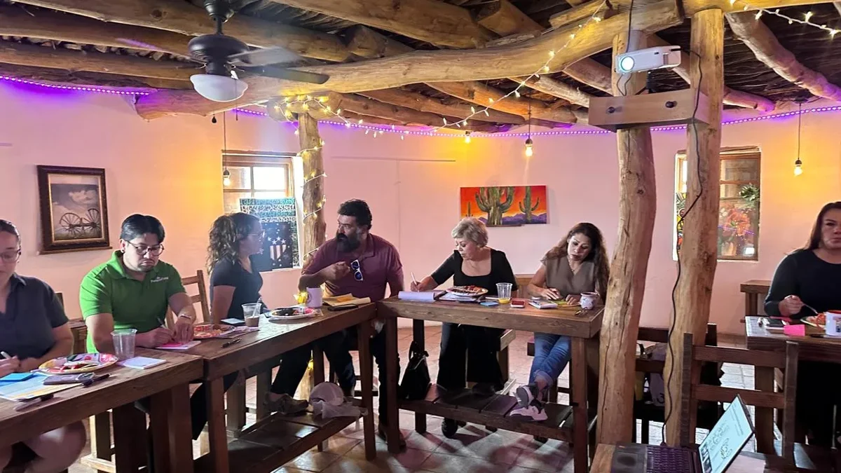 Business owners in a group discussion